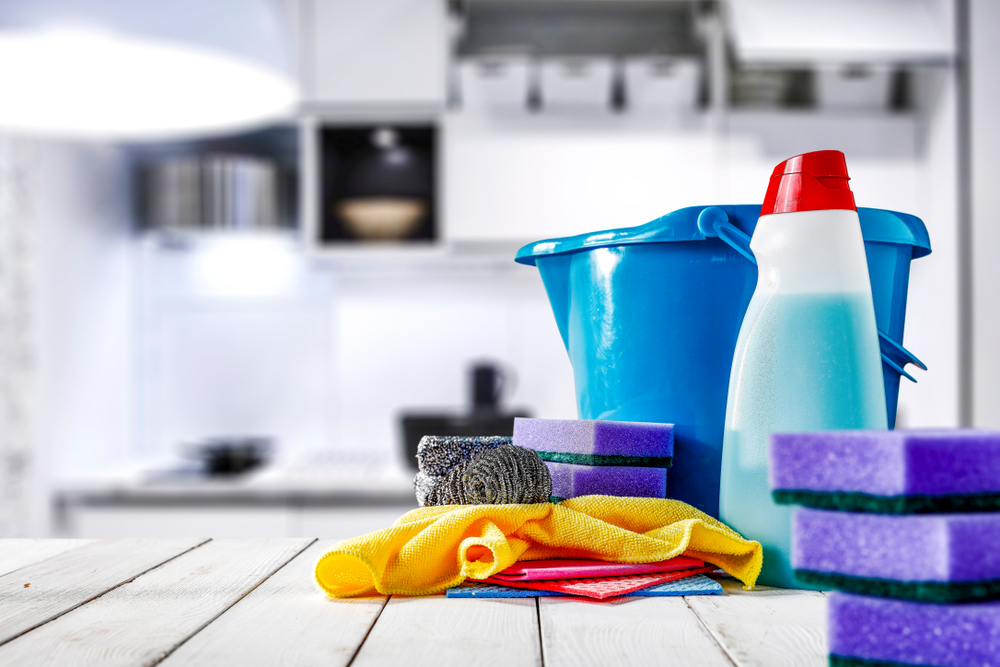 Professional Cleaning Products on a Kitchen Floor